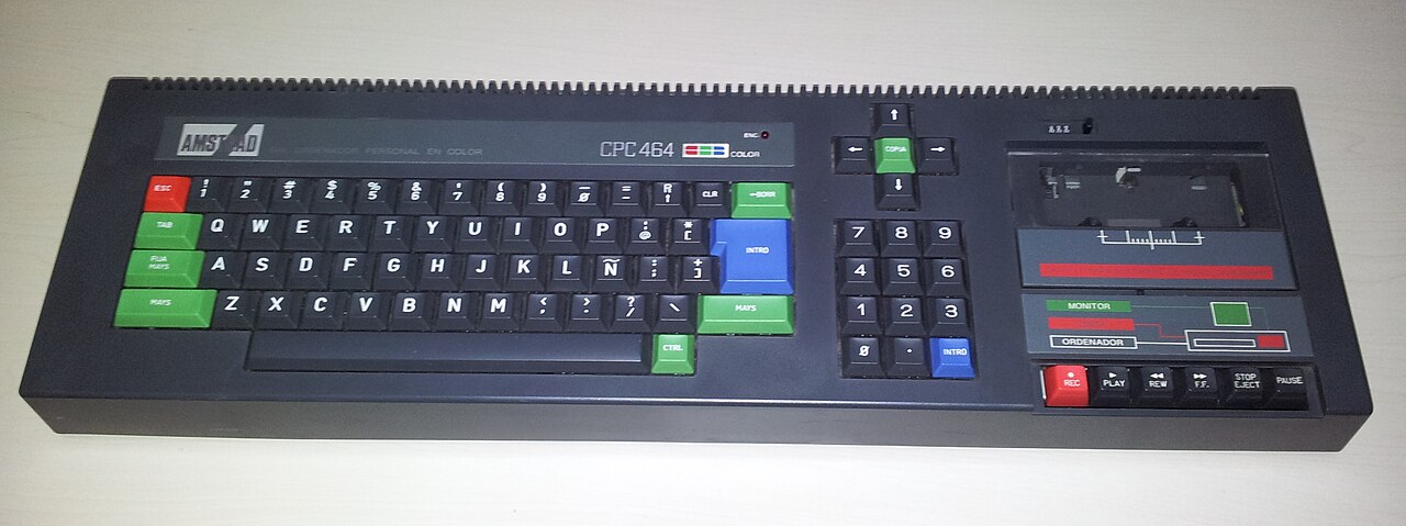 Top view of the Amstrad CPC 464 keyboard with its coloured keys, numeric keypad and cassette deck