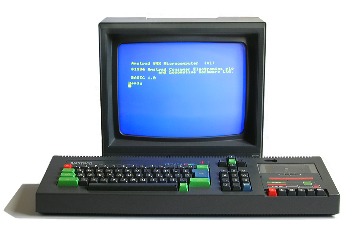 The Amstrad CPC 464: a black keyboard unit with red, green and blue keys and a cassette deck built in on the right