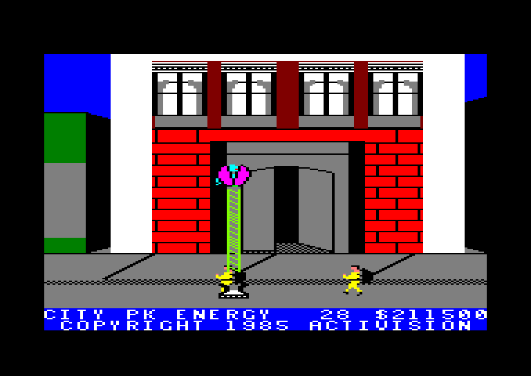 Ghostbusters on the Amstrad CPC: a red brick building with the Ghostbusters running towards the door to trap a ghost